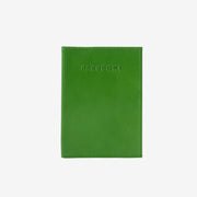 Green passport holder with 'PASSPORT' text on a white background -GRASS/INDIGO