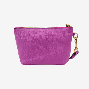 Purple cosmetic beauty pouch with gold zipper and strap on a light gray background - MAGENTA