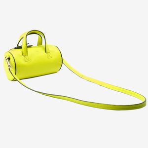 Sai Mini Barrel Bag in lime Italian leather with extended crossbody strap, showing sculptural barrel shape - LIME