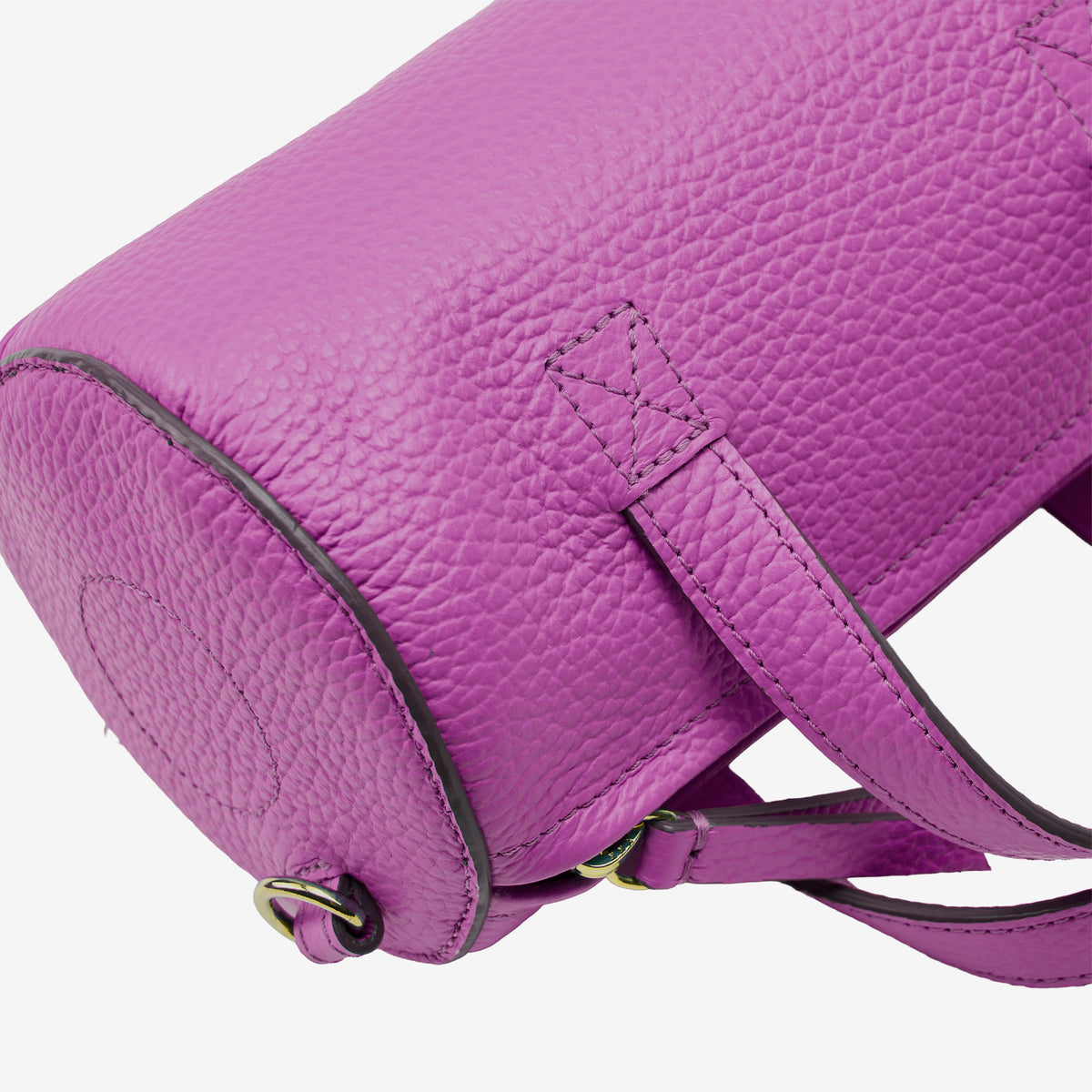 sai mini barrel bag magenta italian leather closeup barrel base strap detail - MAGENTA