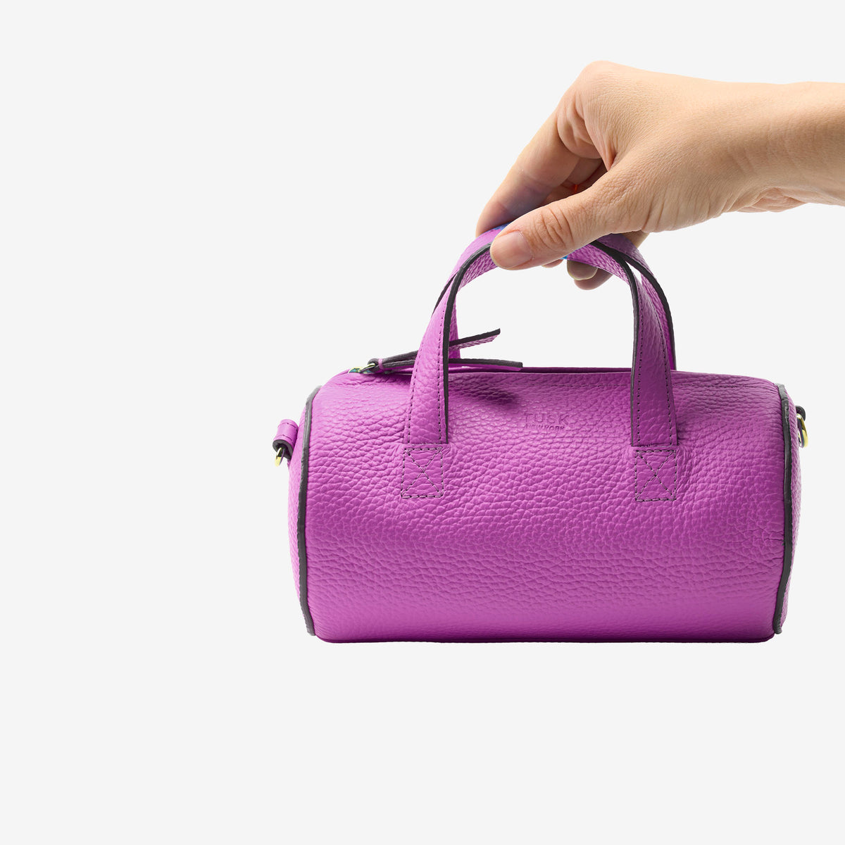 sai mini barrel bag magenta italian leather hand scale view - MAGENTA