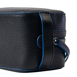 Black textured leather toiletry case with blue accents on a white background - BLACK