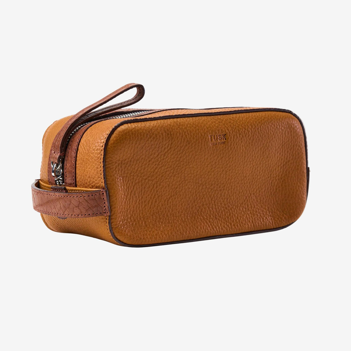 Tan leather toiletry bag with zipper on a white background - TAN