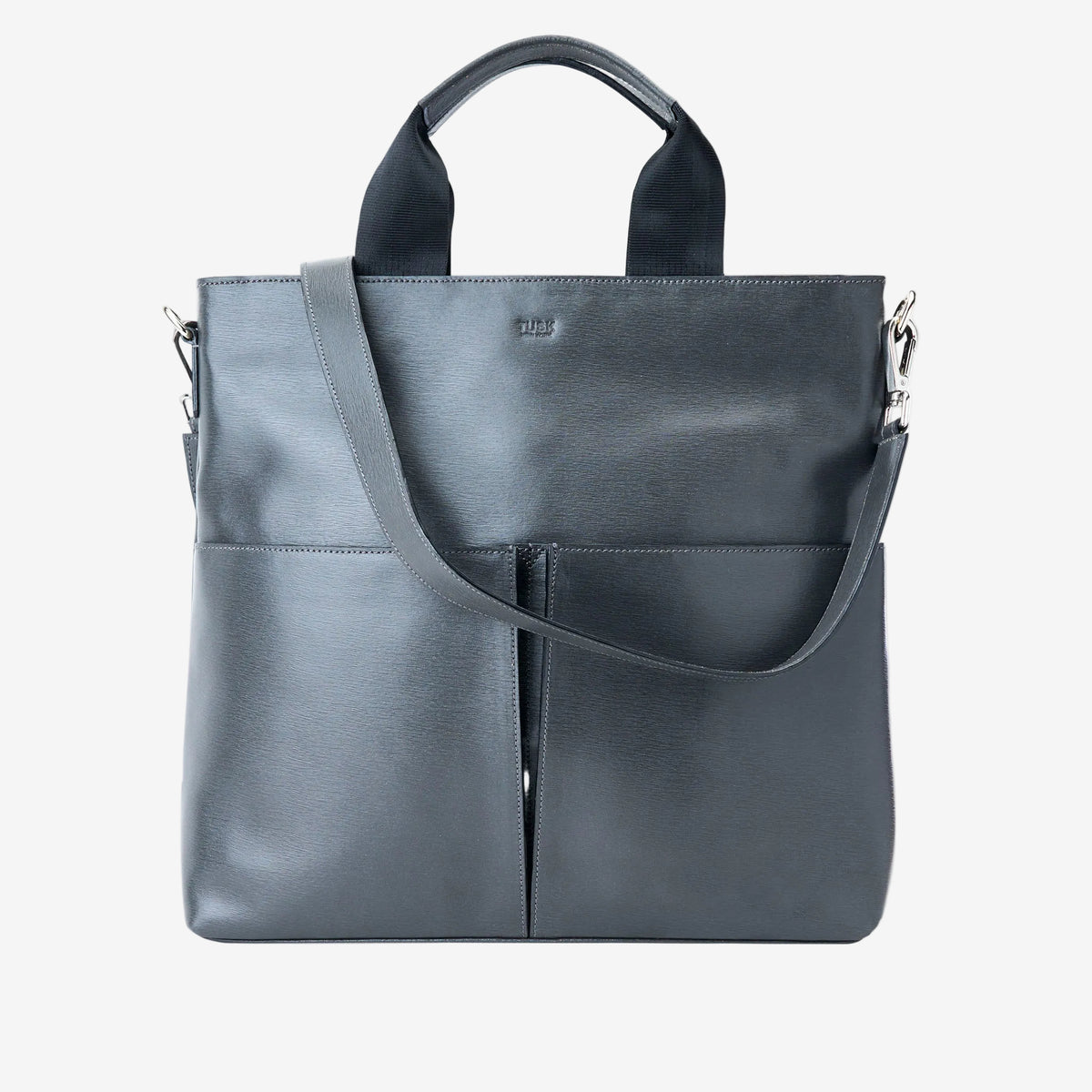 A dark gray leather tote bag with top handles and a shoulder strap, shown against a plain white background - CHARCOAL