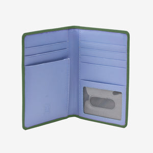 Tusk 128 Ascot Passport Wallet in forest Italian pebble-grain cowhide leather. Open view showing card slots, ID window and the original lavender-blue interior - FOREST