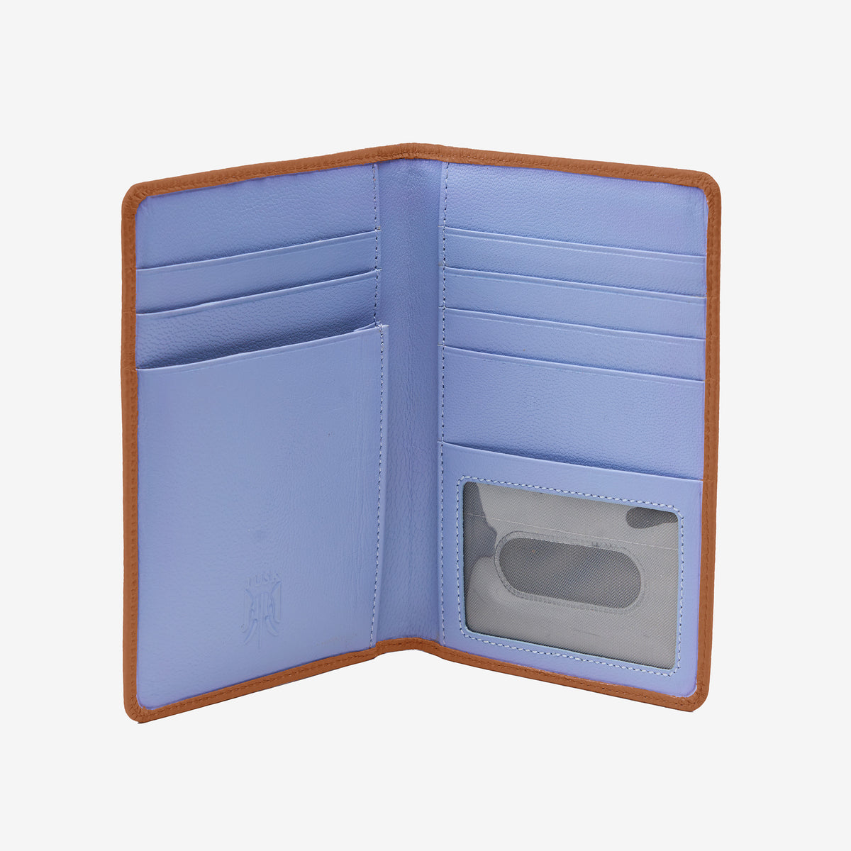 Tusk 128 Ascot Passport Wallet in toast Italian pebble-grain cowhide leather. Open view showing card slots, ID window and the original lavender-blue interior - TOAST