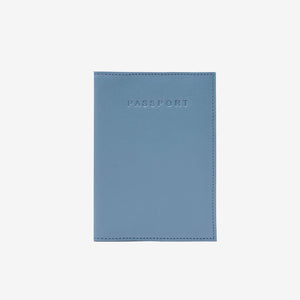 Blue passport holder with 'PASSPORT' text  embossed on front on a white background - FRENCH BLUE/GERANIUM
