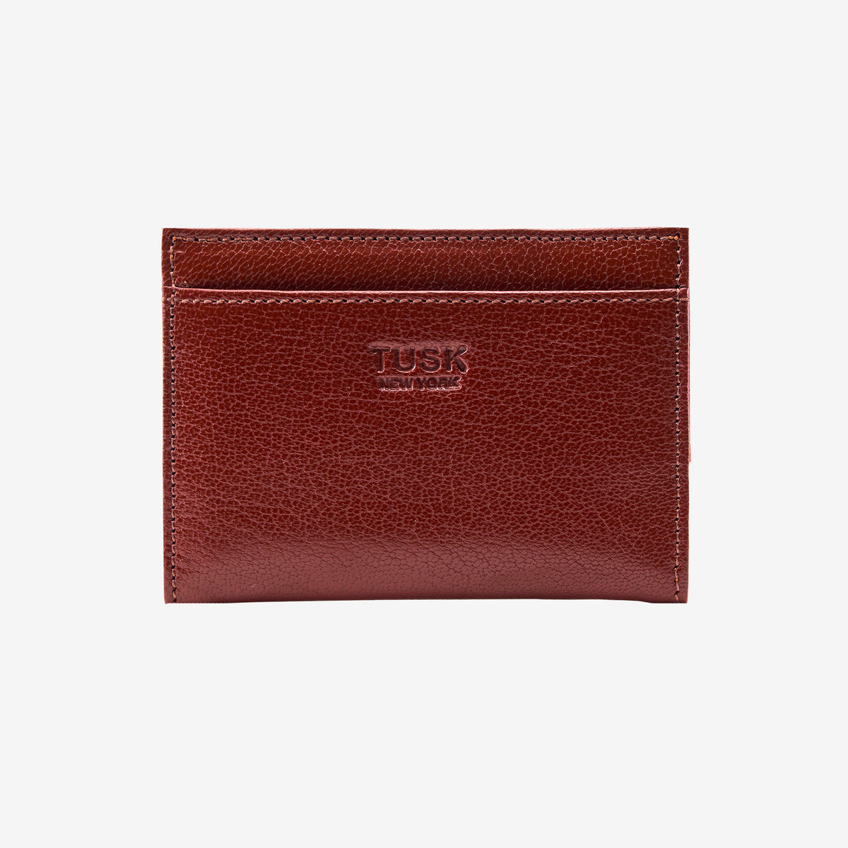 Brown leather cardholder with 'TUSK' branding on a white background - CHOCOLATE/ORANGE