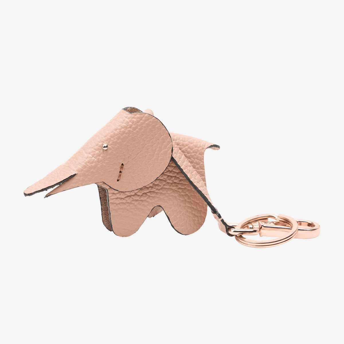 Beige elephant-shaped keychain on a white background - NUDE
