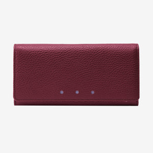Maroon leather wallet on a light gray background - OXBLOOD