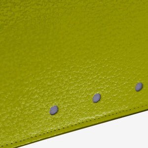 Tusk 376 Ascot Flap Over Wallet in avocado Italian pebble-grain cowhide leather. Close-up of the photographed pebble-grain leather and matching stitching - AVOCADO