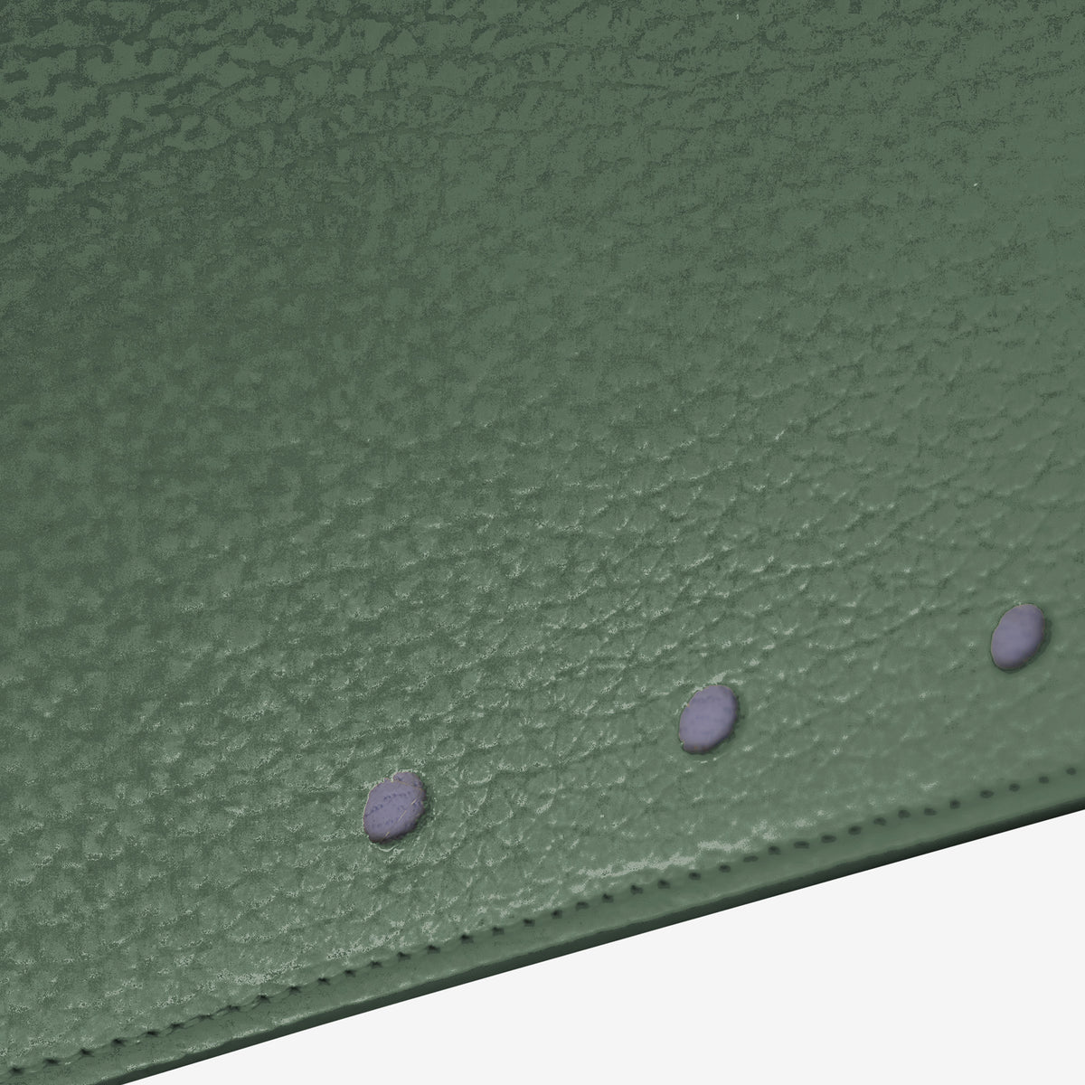 Tusk 376 Ascot Flap Over Wallet in forest Italian pebble-grain cowhide leather. Close-up of the photographed pebble-grain leather and matching stitching - FOREST