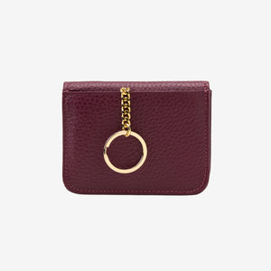Maroon wallet with a gold chain and key ring on a white background - OXBLOOD