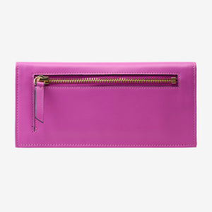 Tusk Lille leather clutch wallet, back view with zip pocket – MAGENTA