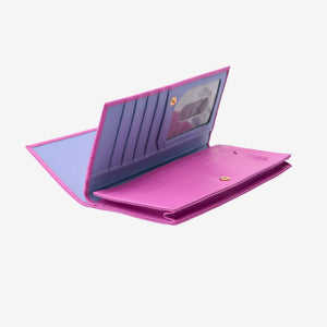 Tusk Lille leather clutch wallet, open view showing interior compartments and card slots – MAGENTA