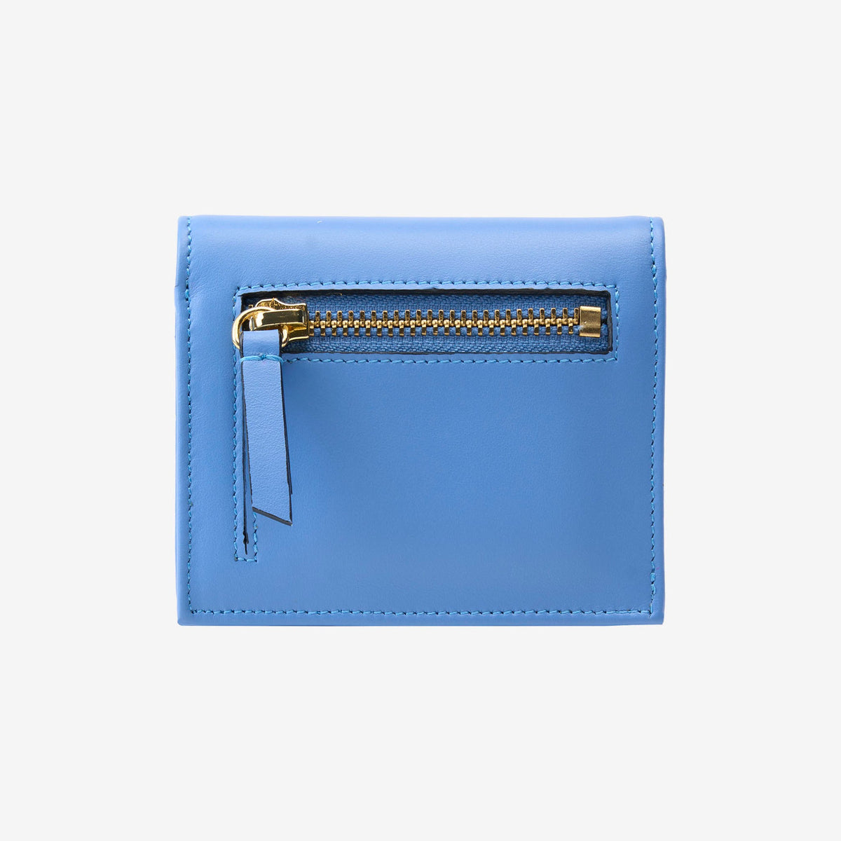 Tusk Lille gusseted French leather wallet in French blue, shown from the back, highlighting the exterior zip pocket - FRENCH BLUE