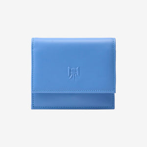 Tusk Lille gusseted French leather wallet in French blue, closed, front view showing the flap closure - FRENCH BLUE