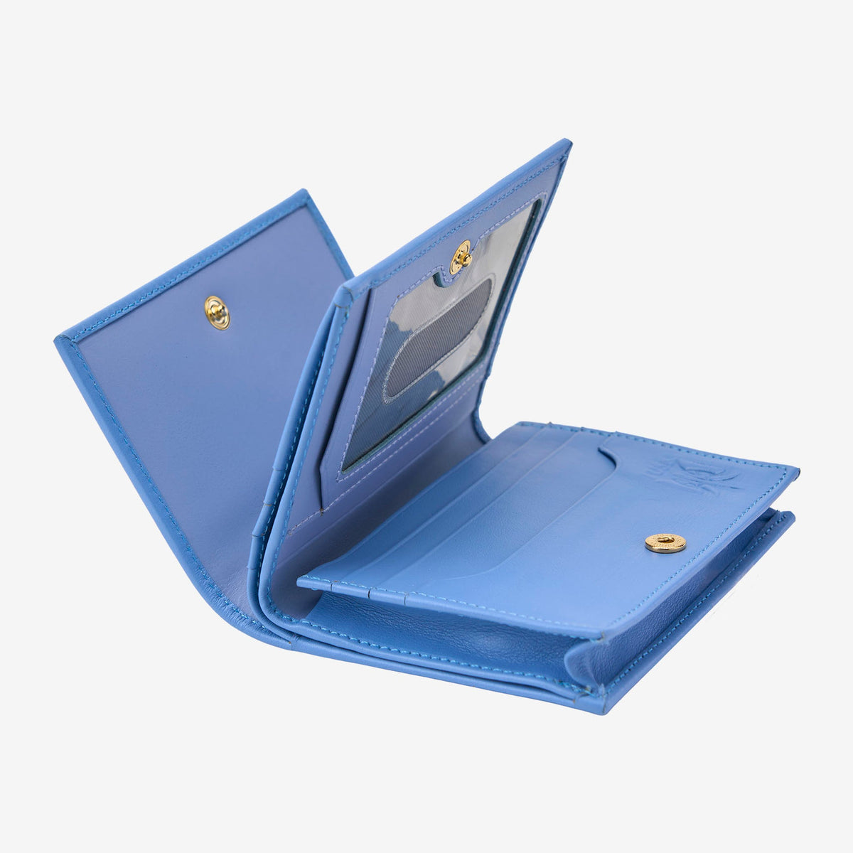 Tusk Lille gusseted French leather wallet in French blue, opened to show its interior card slots and compartments - FRENCH BLUE