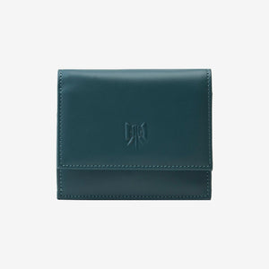 Tusk Lille gusseted French leather wallet in hunter green, closed, front view showing the flap closure - HUNTER