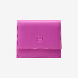 Tusk Lille gusseted French leather wallet in magenta, closed, front view showing the flap closure - MAGENTA