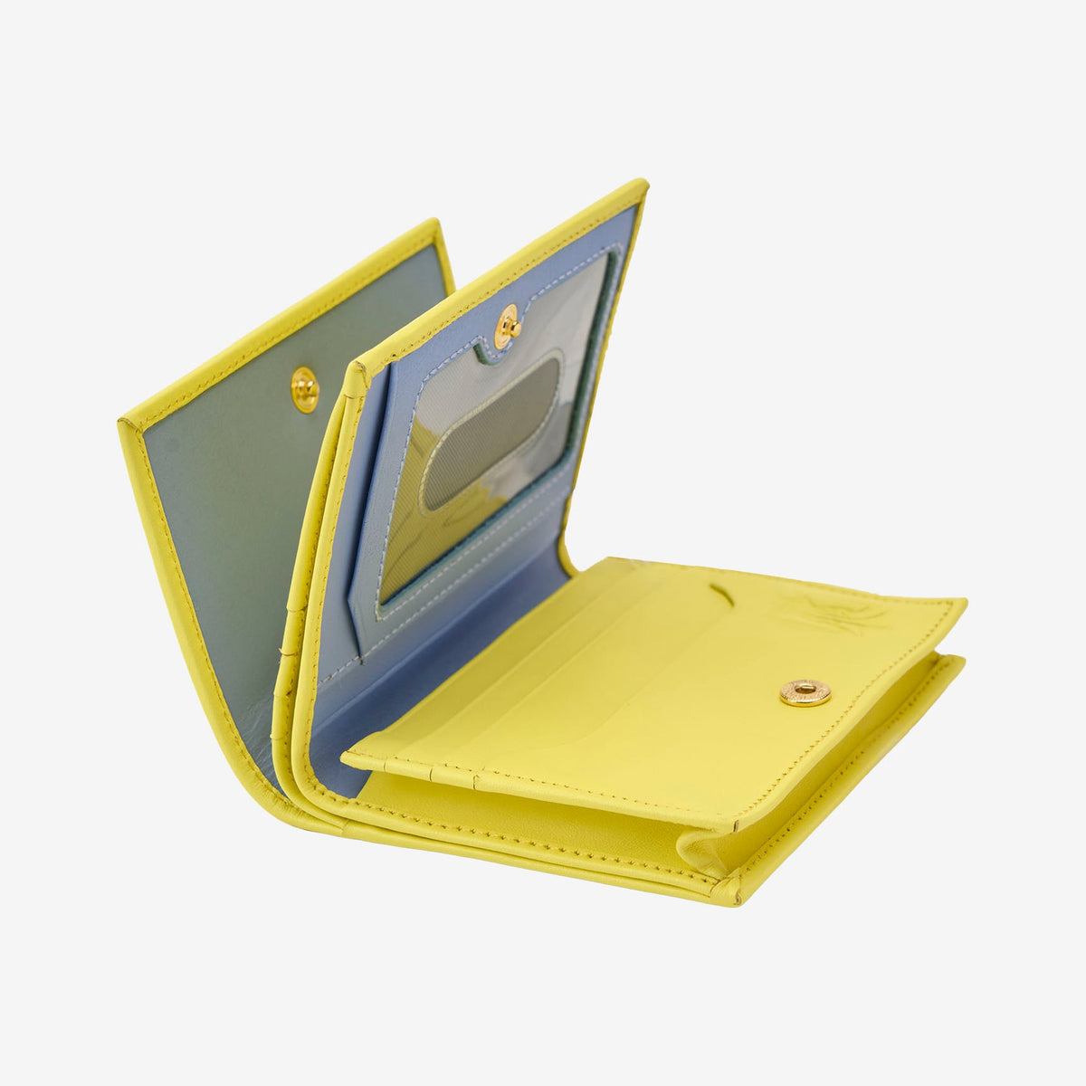 Tusk Lille gusseted French leather wallet in yellow Sun, opened to show its interior card slots and compartments - SUN