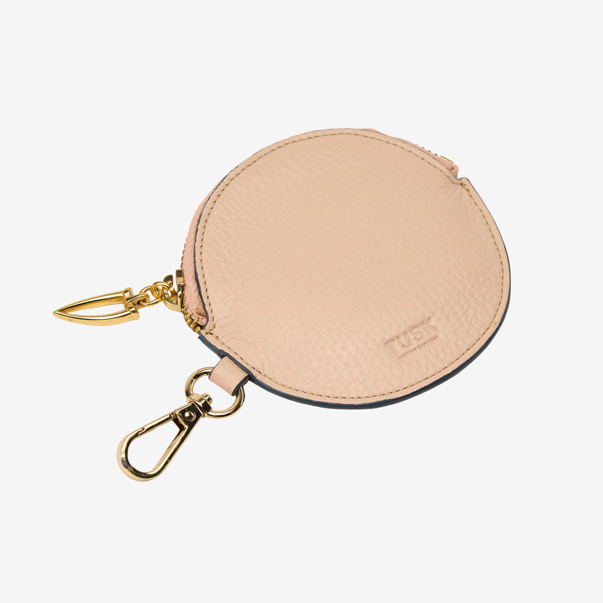 Beige round keychain charm with gold clip on a white background - NUDE