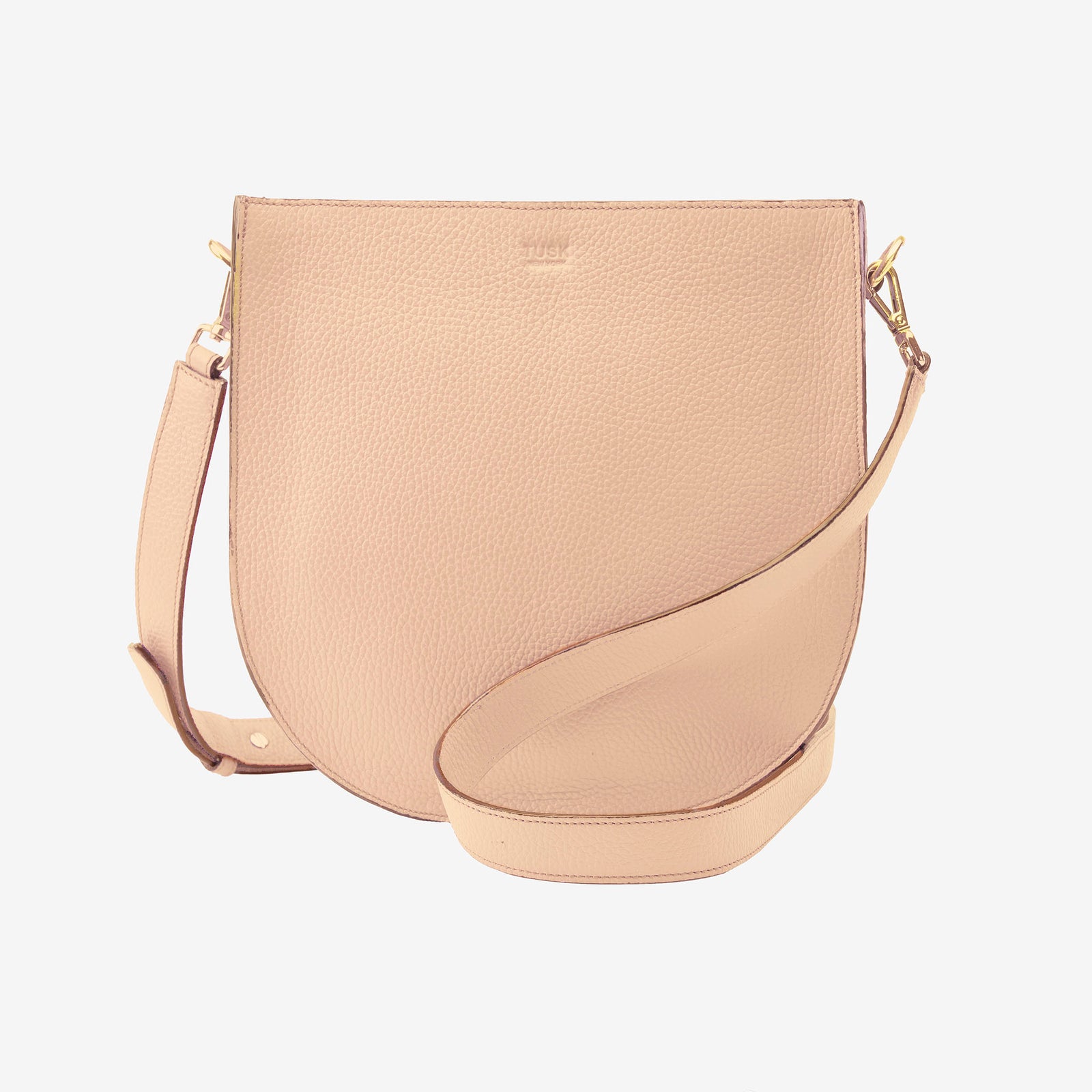 Beige handbag with a strap on a light beige background - NUDE
