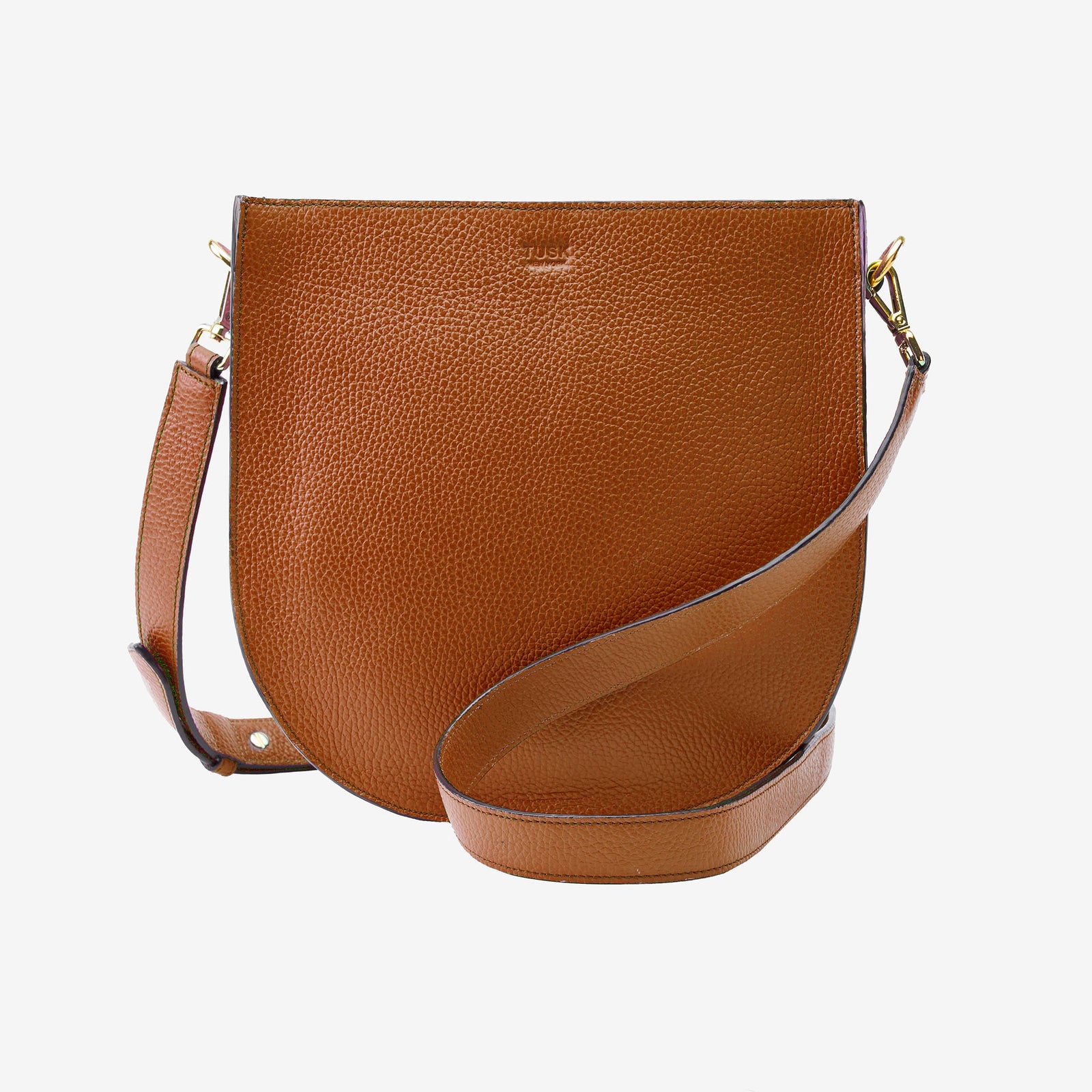 Brown leather handbag with a strap on a white background - TOAST