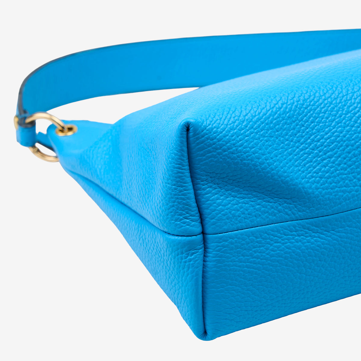 Blue leather handbag with a strap on a white background - AZURE