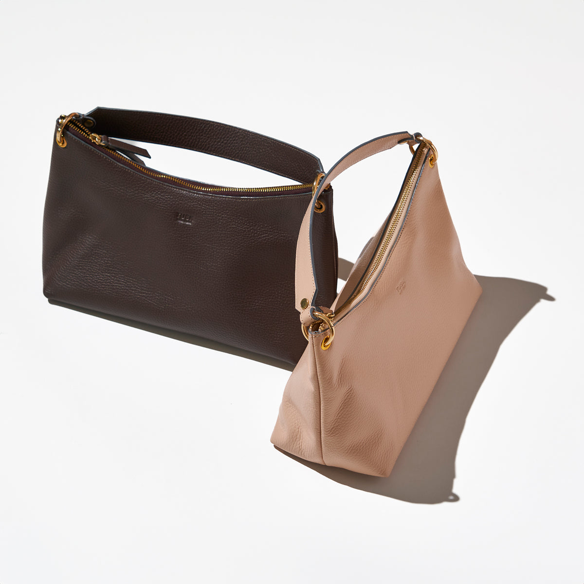 tusk-9937-pebble-grain-leather-hobo-espresso-nude-still-01 - NUDE