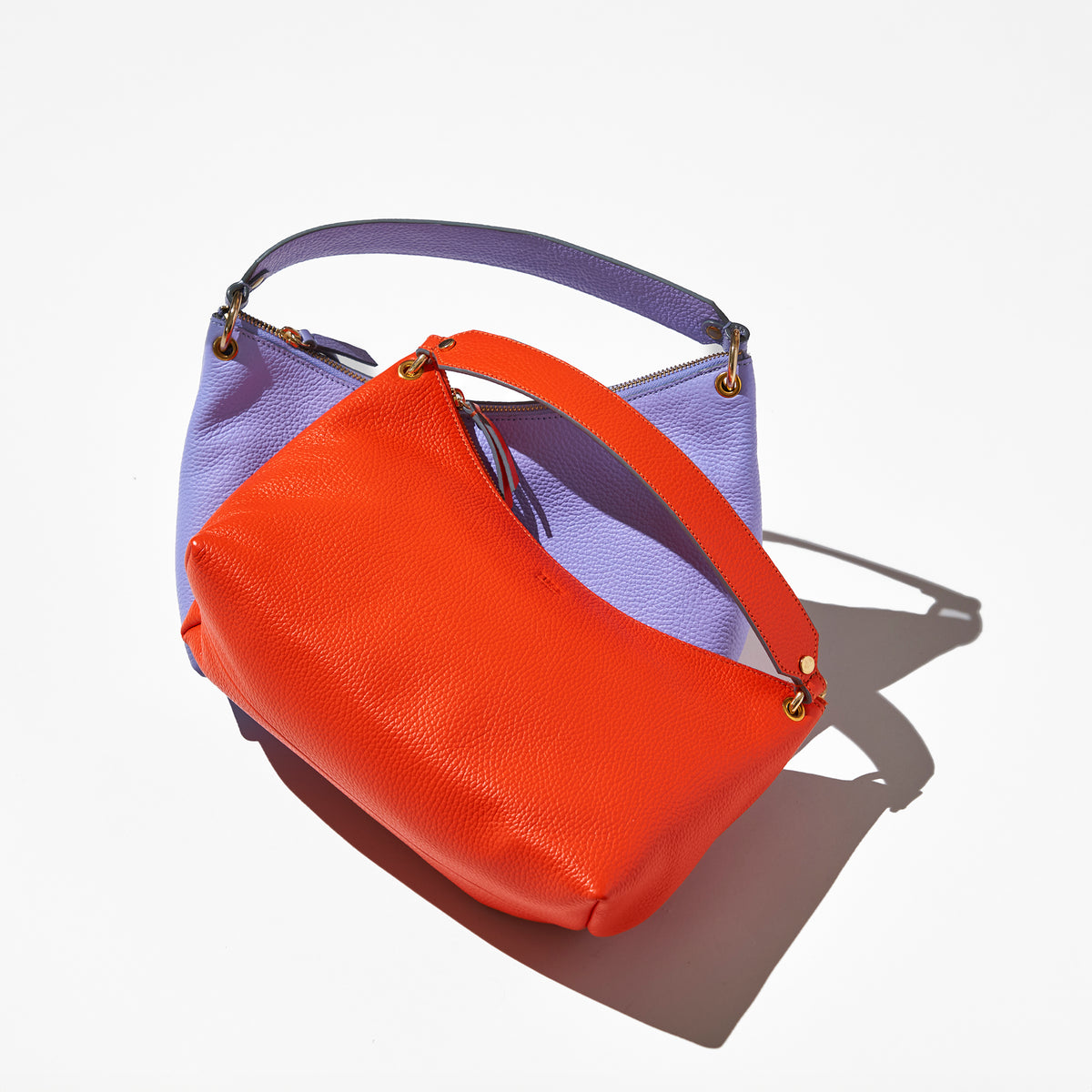 tusk-9937-pebble-grain-leather-hobo-orange-lavender-still-01 - ORANGE, LAVENDER