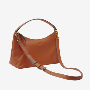 Brown leather handbag with a shoulder strap on a white background -TOAST