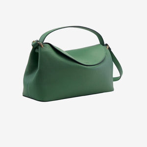 Green leather handbag on a light gray background - FOREST