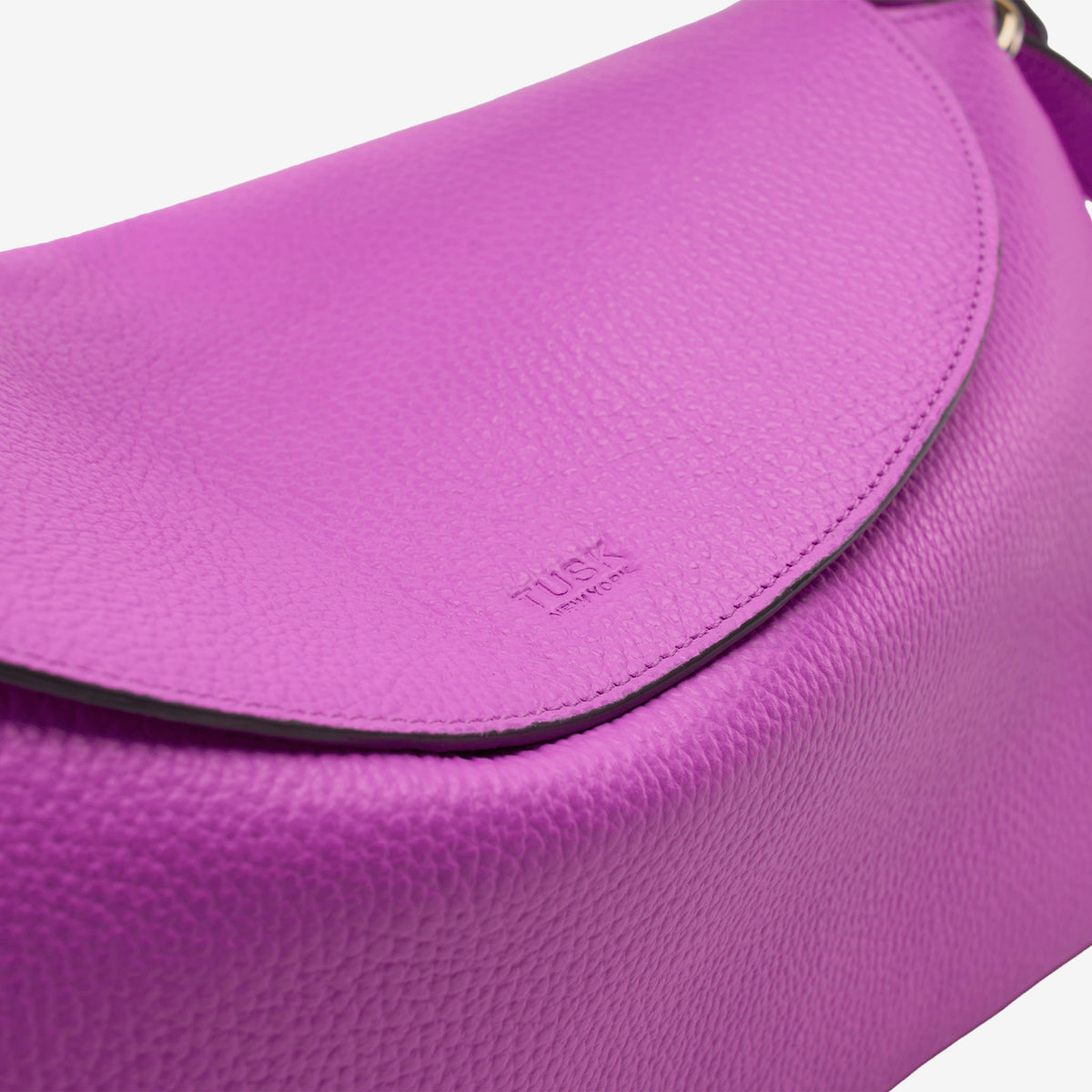 Purple handbag with a visible brand logo on a white background - MAGENTA
