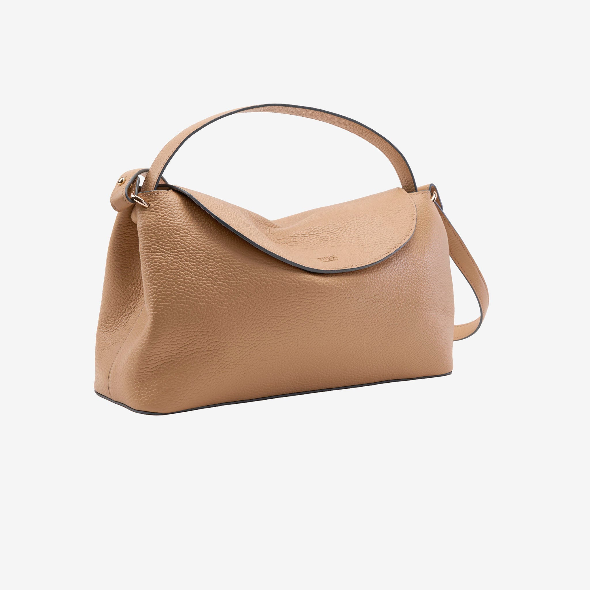 Beige Italian leather handbag on an angle with a strap on a white background - SAND