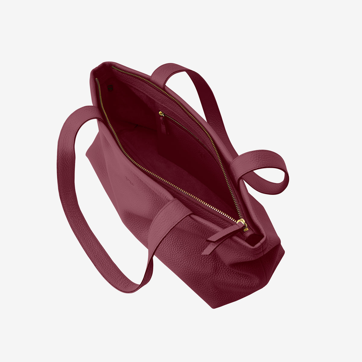 Tusk 9953 Anaya Zip Top Tote in Italian pebble-grain cowhide leather. Open view showing the zip-top opening and interior zipper pocket - OXBLOOD
