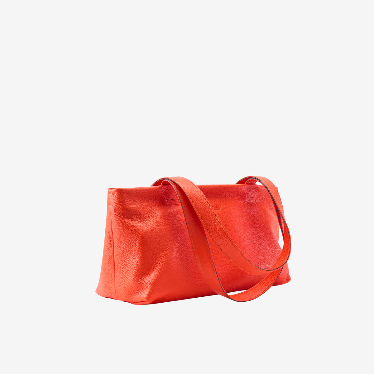 Side view of orange leather tote bag showing soft structure and long straps - ORANGE