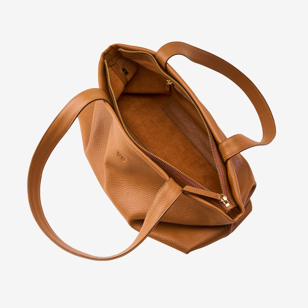 Toast leather zip-top tote bag open showing interior pocket and lining detail - TOAST