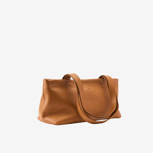 Toast brown leather tote bag side view showing depth and soft structured shape - TOAST