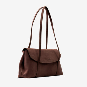 A dark brown suede shoulder bag with a flap closure and long shoulder straps, shown from a three-quarter angle on a light gray background - BROWN