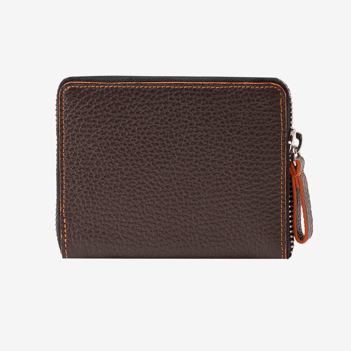Back view of the Tusk Amsterdam men's zip-around wallet in chocolate brown pebble leather, showcasing bright orange contrast perimeter stitching and a brown leather zipper pull tab on a white background - CHOCOLATE
