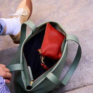 Open sage green Anaya tote showing an orange pouch inside - SAGE